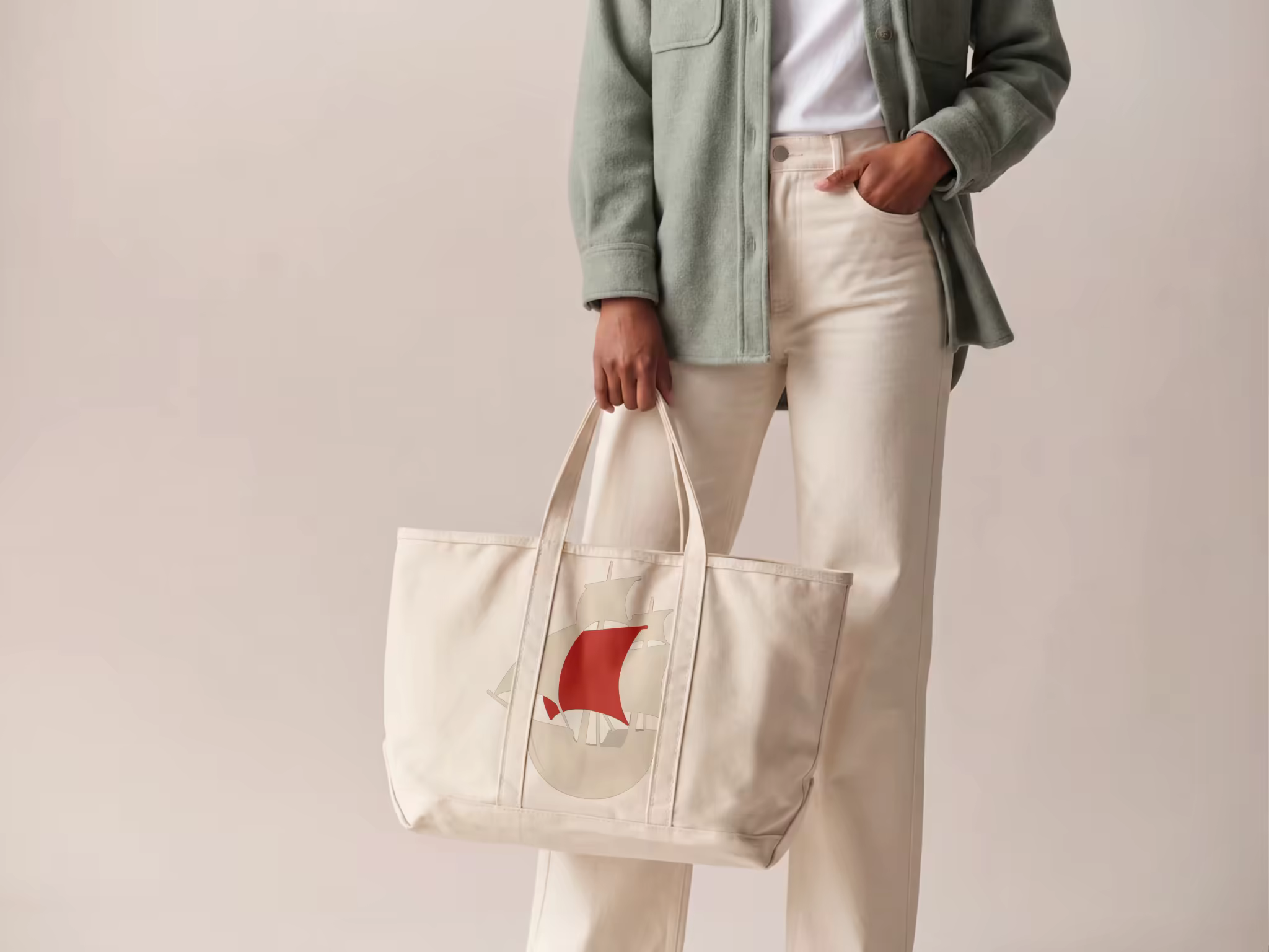 Canvas Tote Bag Mockup Held in a Studio