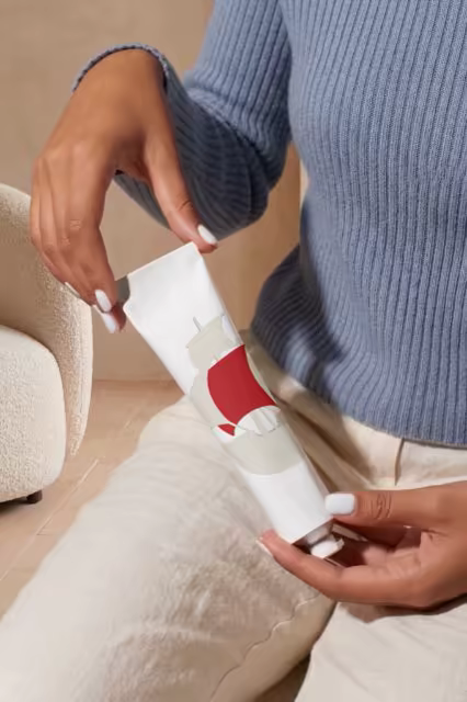 Cosmetic Tube Mockup Held in Both Hands