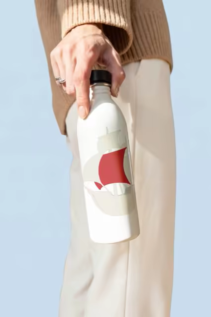 Water Bottle Mockup Carried Under a Blue Sky