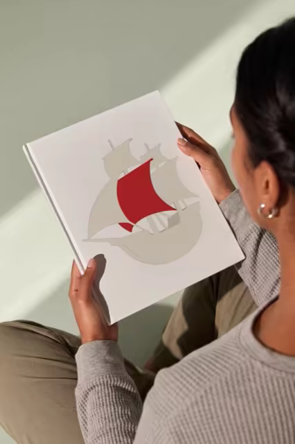 Hardcover Book Mockup Read Over the Shoulder