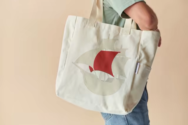 Cotton Tote Bag Mockup Slung on a Shoulder