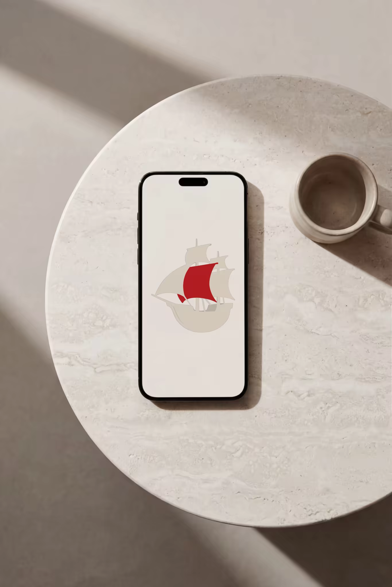 Phone Mockup on a Round Travertine Table