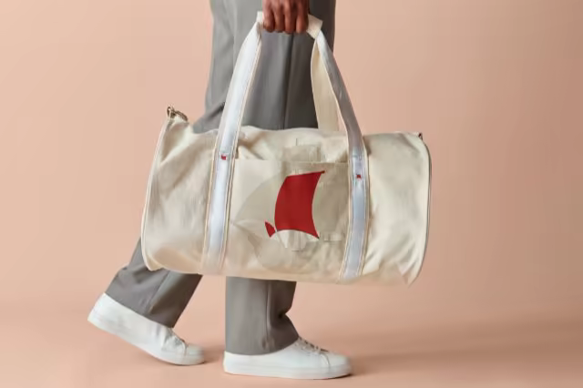 Canvas Duffel Bag Mockup Carried Mid-Stride