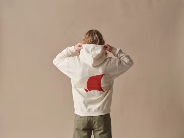 Cream Hoodie Mockup With the Hood Pulled Up