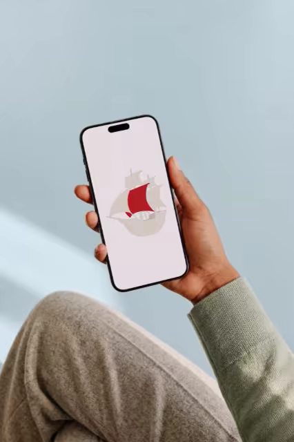 Phone in Hand Mockup With a Cozy Sweater