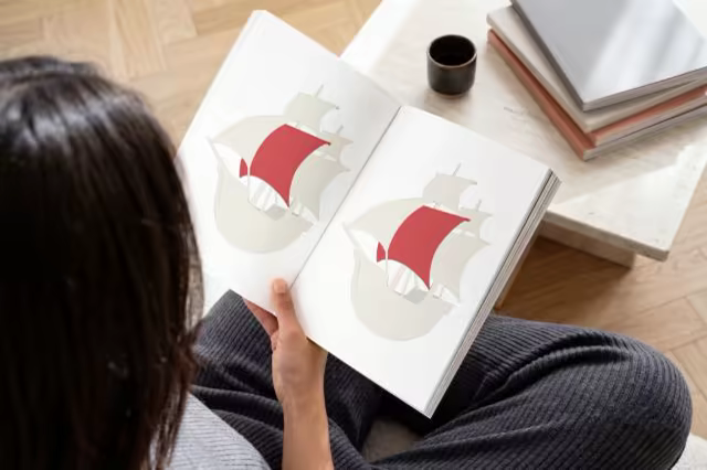 Open Magazine Mockup Read in a Living Room
