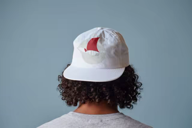 Backwards Cap Mockup on a Blue Grey Backdrop