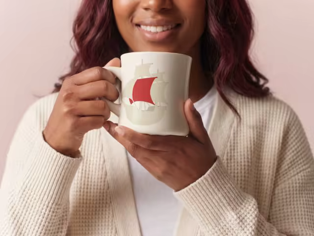 Cream Mug Mockup Held With Both Hands