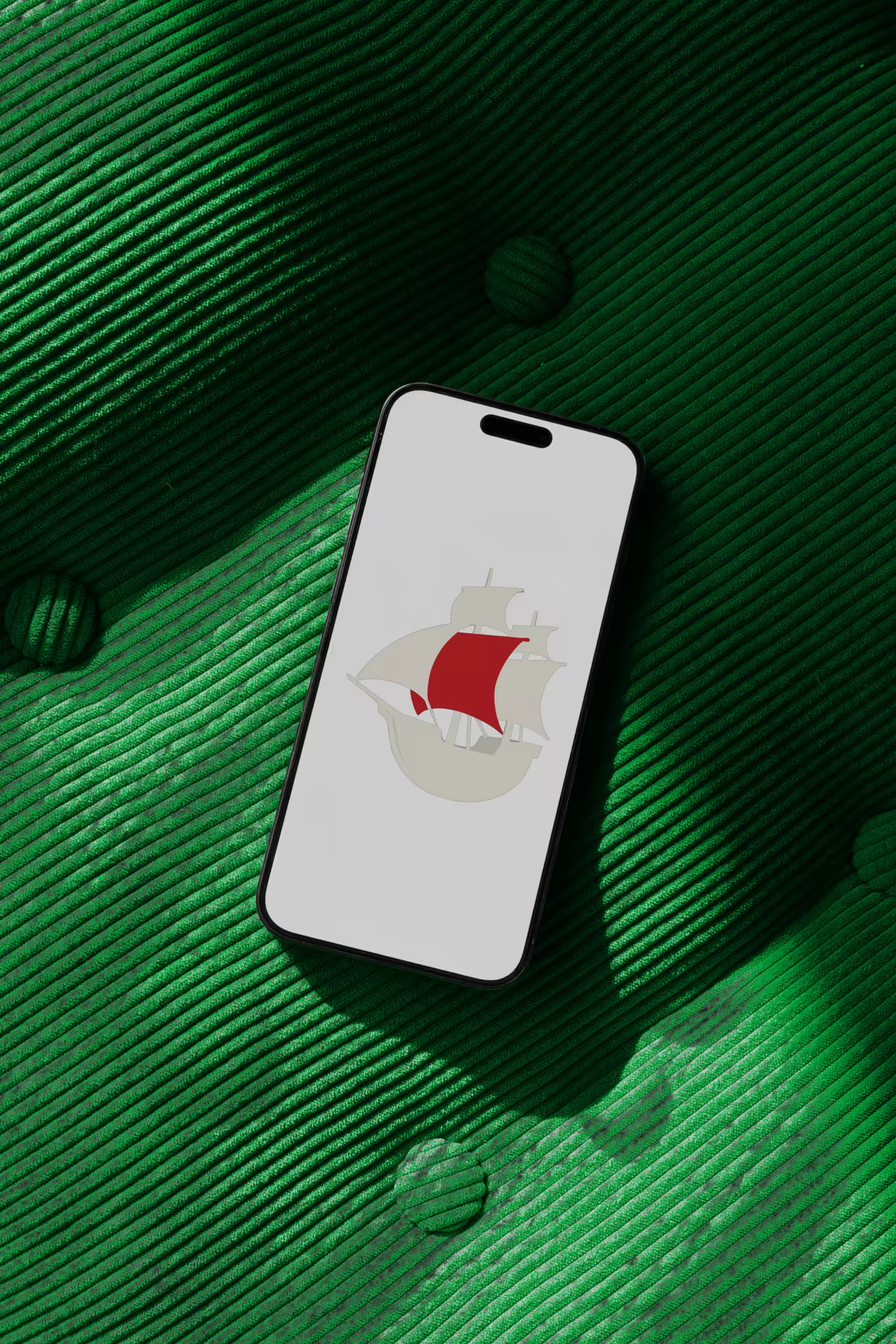 Phone Mockup on Emerald Corduroy Upholstery