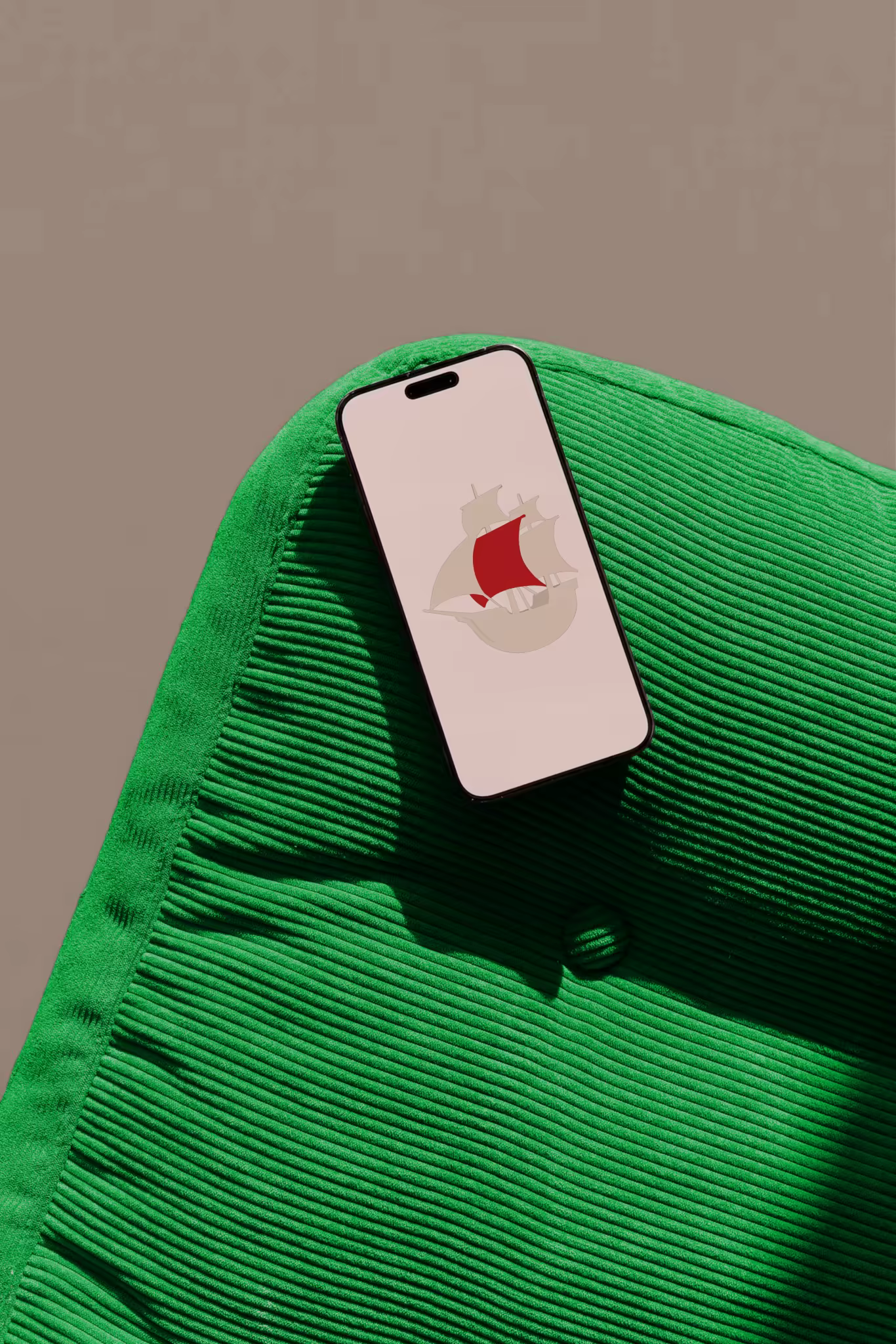 Phone Mockup on a Green Corduroy Armchair