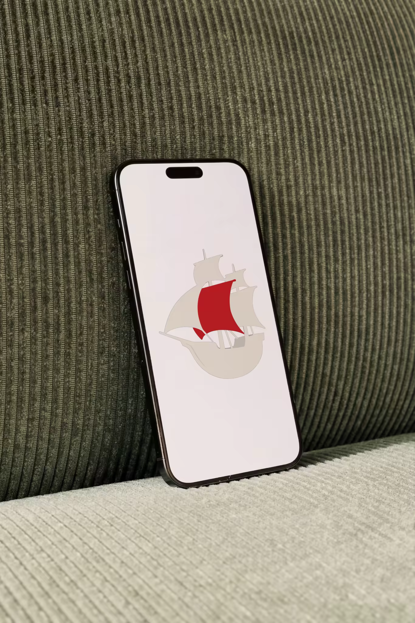 Phone Mockup on a Ribbed Green Corduroy Sofa