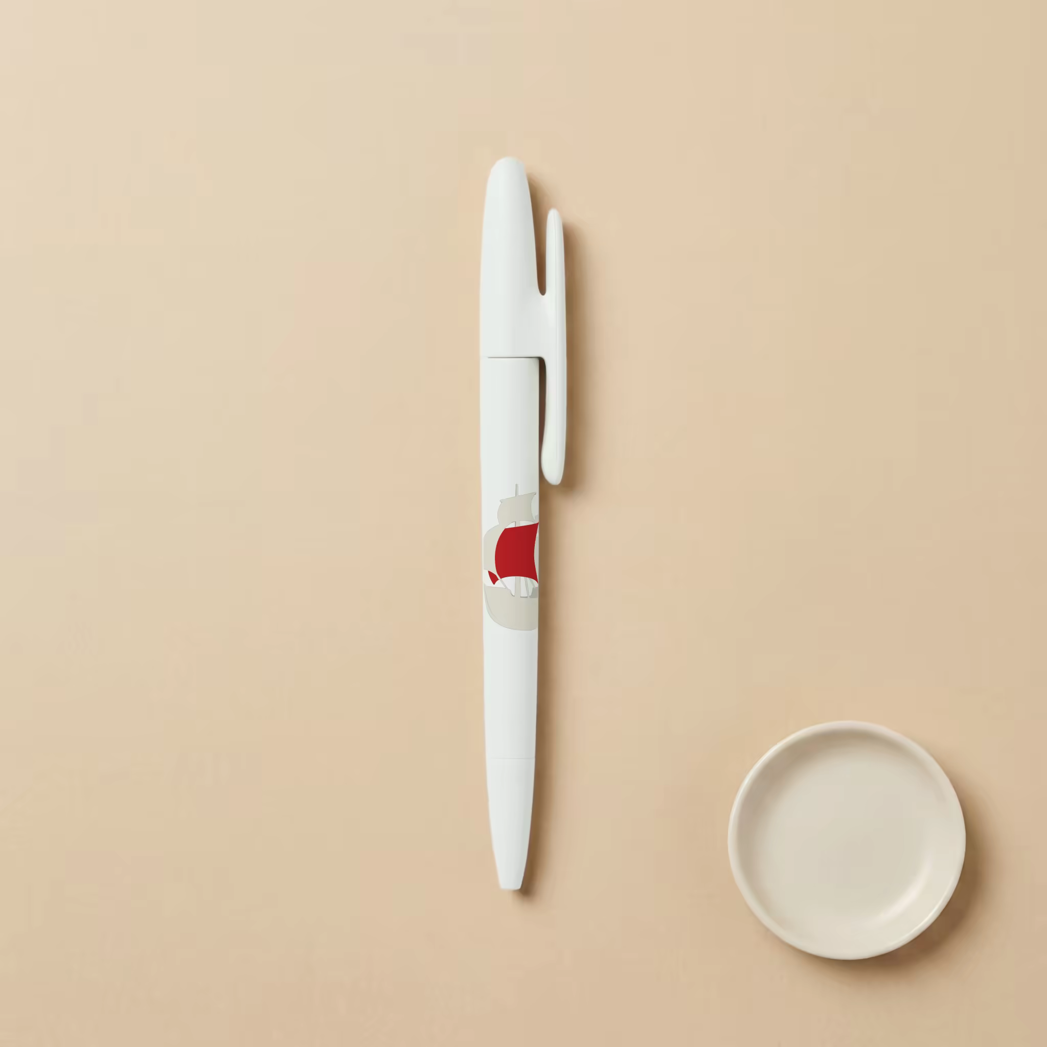White Pen Mockup Beside a Ceramic Dish