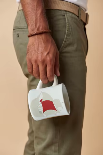 Coffee Mug Mockup Dangling From a Hand