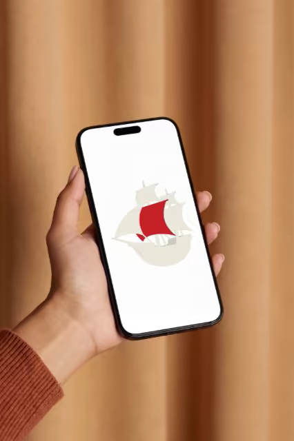 Phone Mockup in Hand Before Camel Curtains