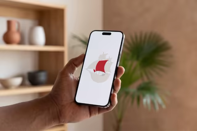 Phone Mockup in Hand by Wooden Shelves