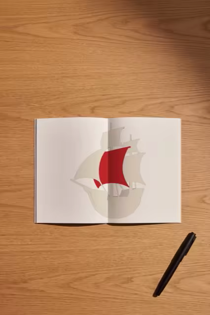 Open Notebook Mockup on an Oak Desk