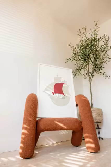 Framed Poster Mockup on a Boucle Armchair