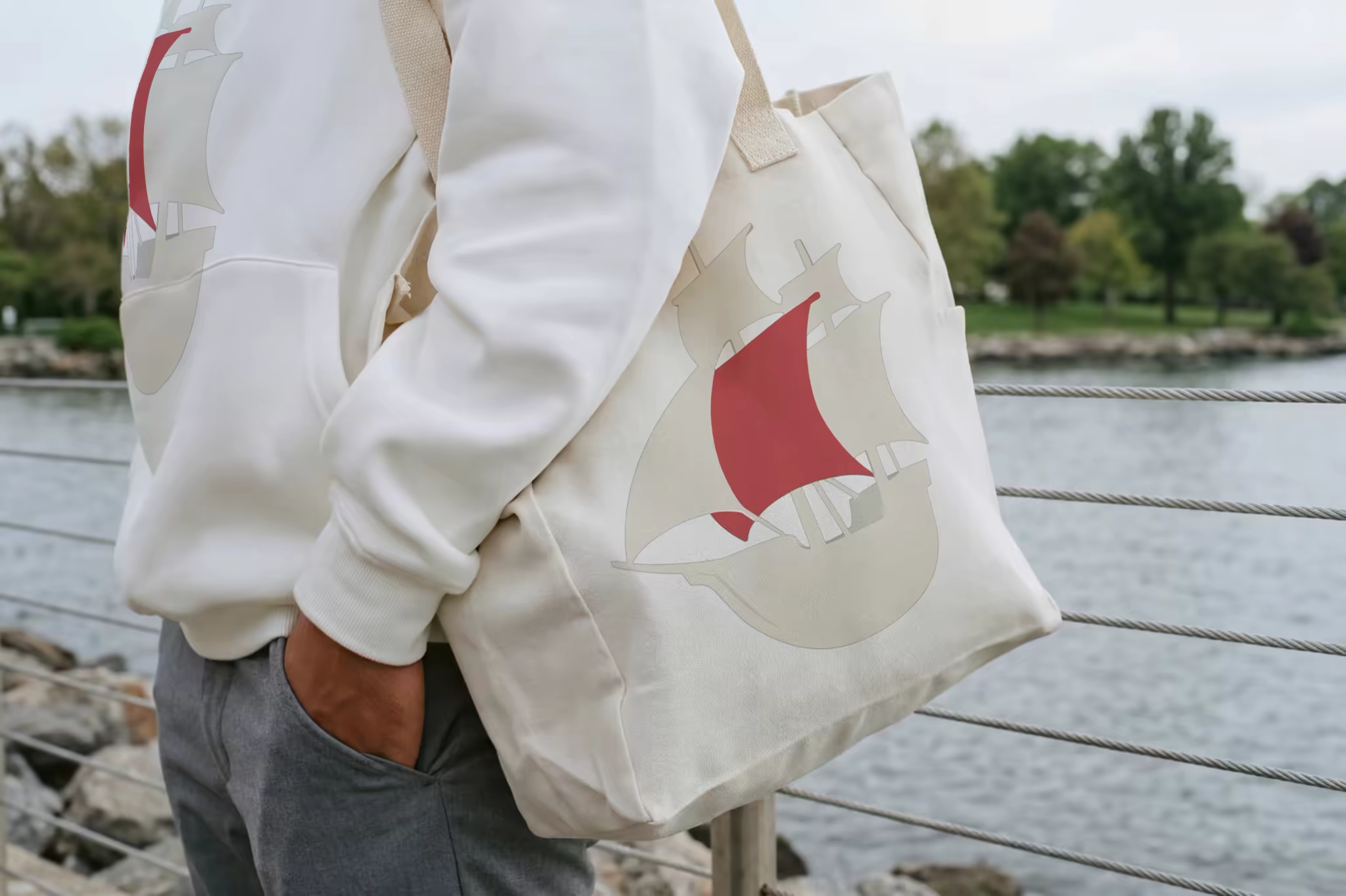 Canvas Tote Mockup Carried by the Waterfront