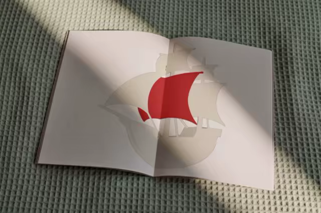 Open Booklet Mockup on a Waffle Blanket
