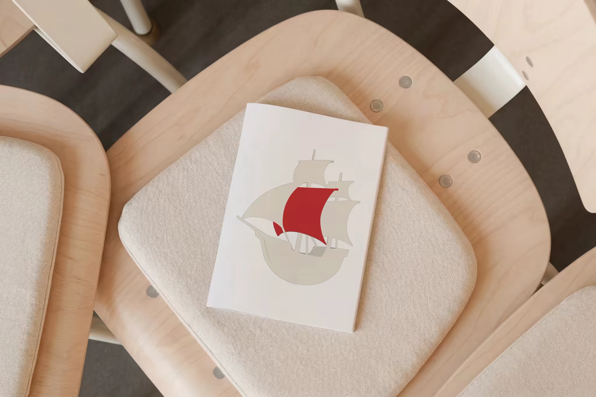 Softcover Book Mockup on a Birch Chair Seat
