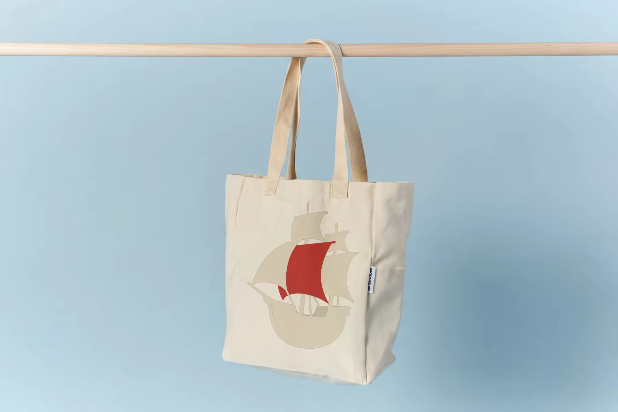Canvas Tote Bag Mockup Hanging on a Wooden Rail
