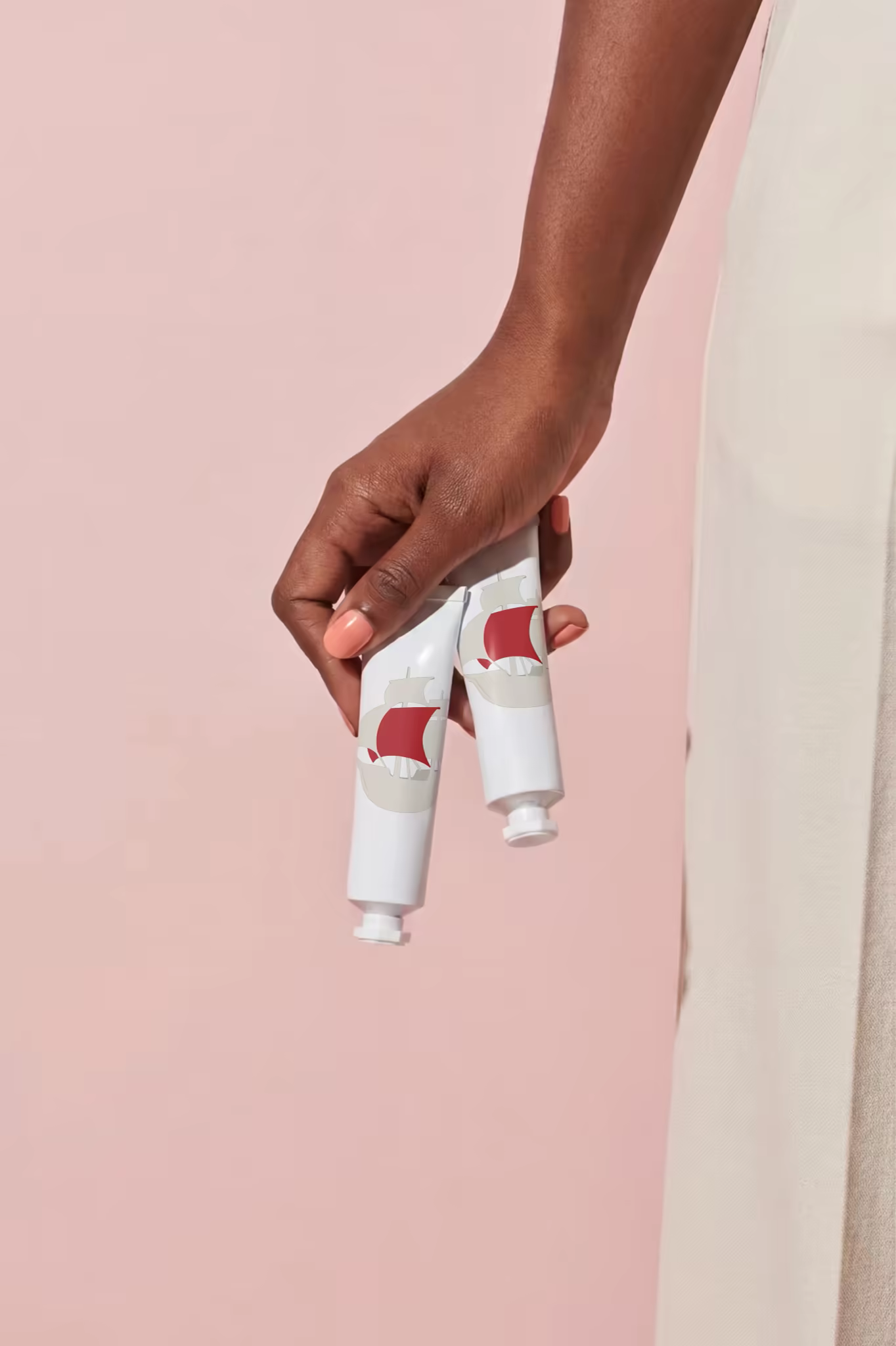 Cosmetic Tube Mockup Pair Held in Hand