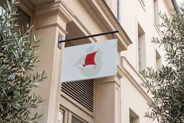 Hanging Shop Sign Mockup on a Classic Facade