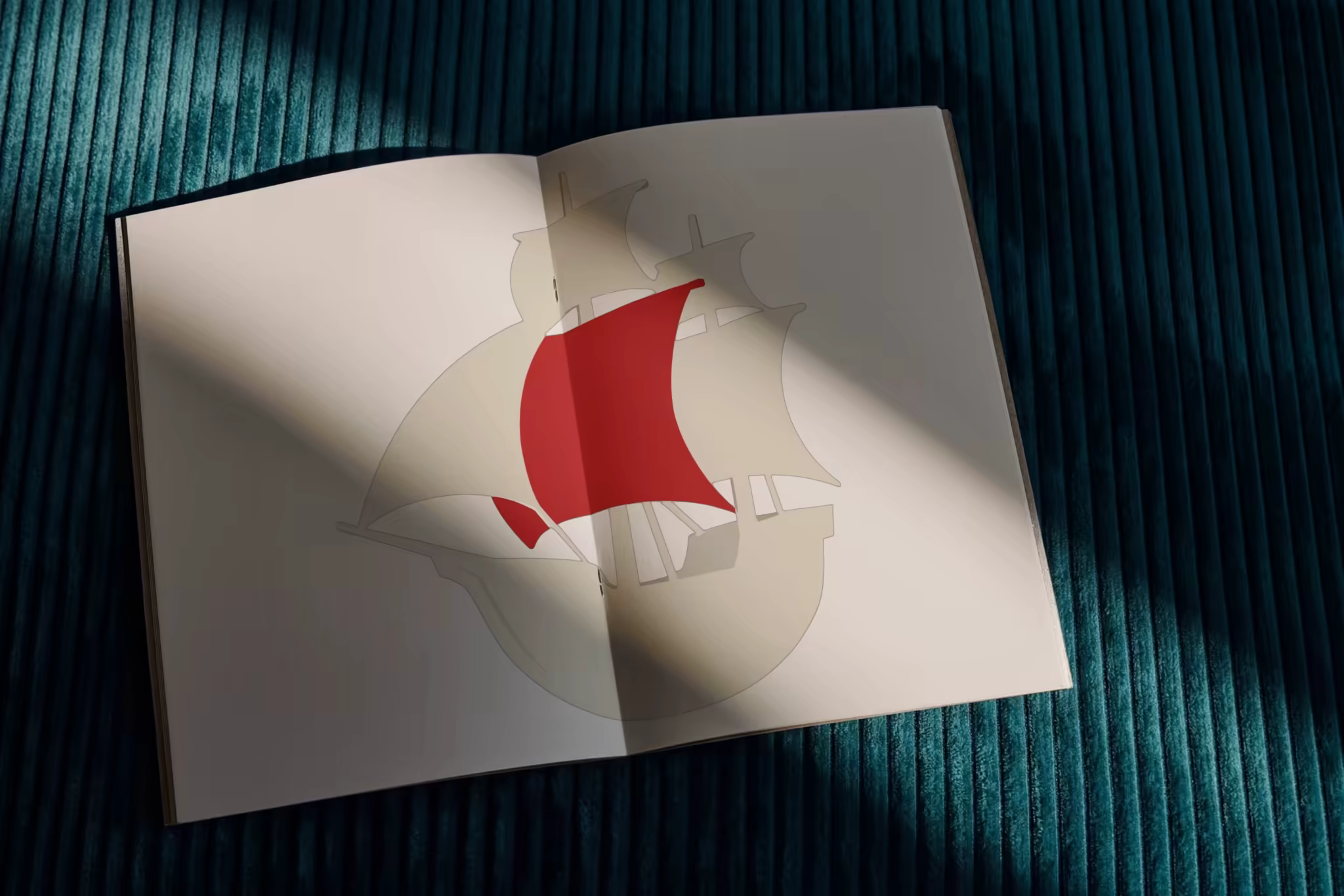 Open Book Mockup on Teal Corduroy Fabric
