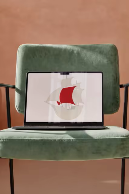 Laptop Mockup on a Green Velvet Chair