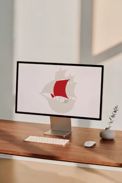 Desktop Monitor Mockup on a Walnut Desk