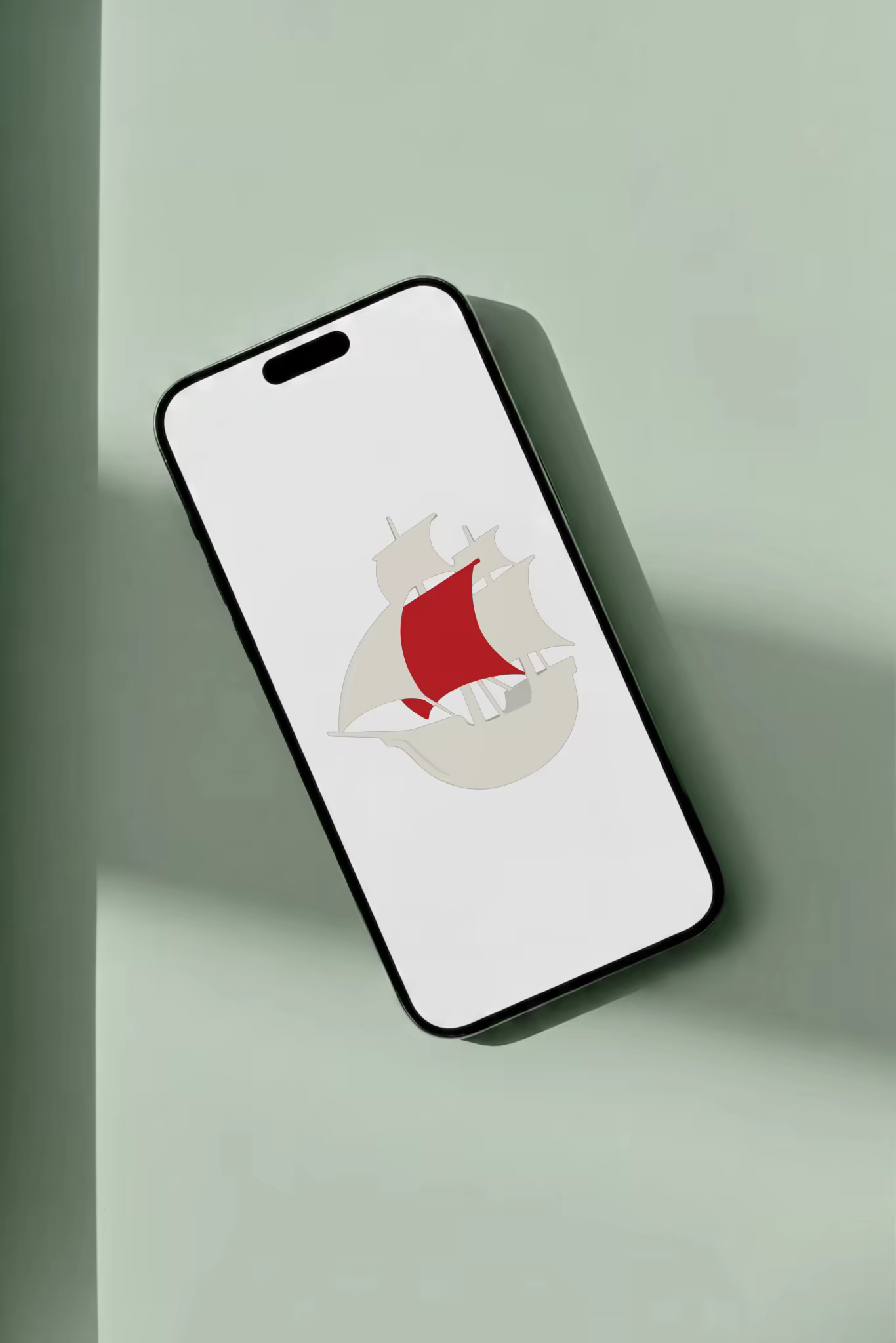 Tilted Phone Mockup on a Sage Green Wall