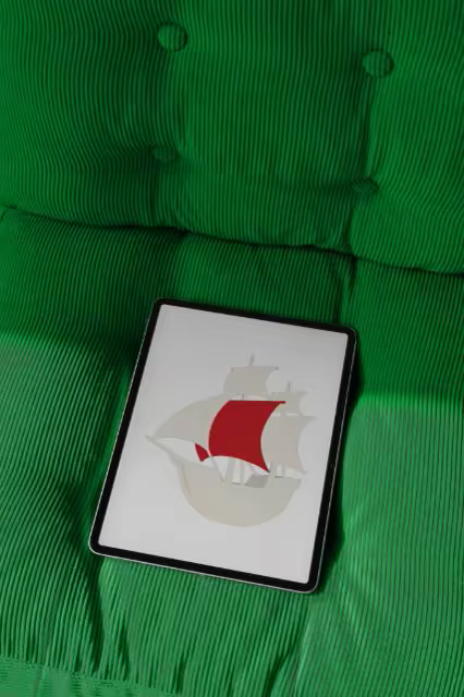 Tablet Mockup on a Green Corduroy Sofa