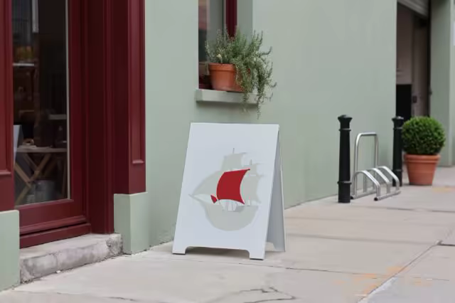 A-Frame Sidewalk Sign Mockup Outside a Storefront