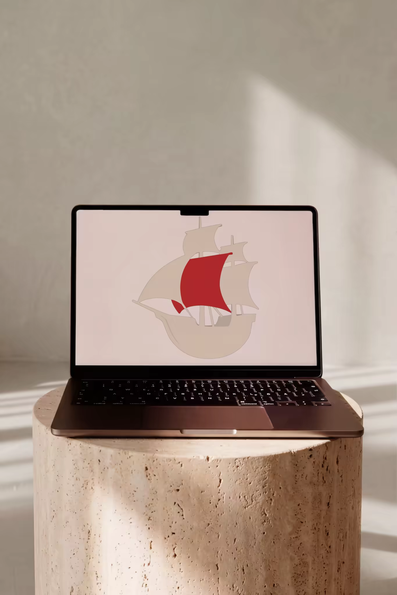 Laptop Mockup on a Round Travertine Plinth
