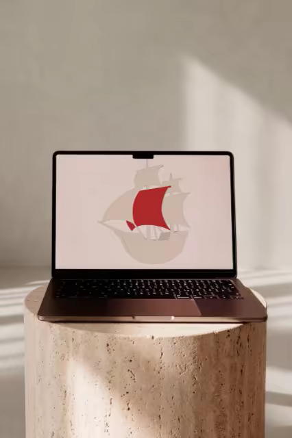Laptop Mockup on a Round Travertine Plinth