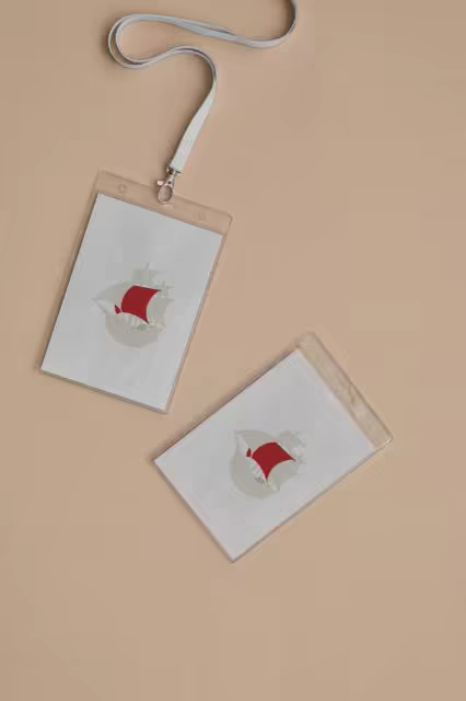 ID Badge Lanyard Mockup on a Warm Beige Backdrop