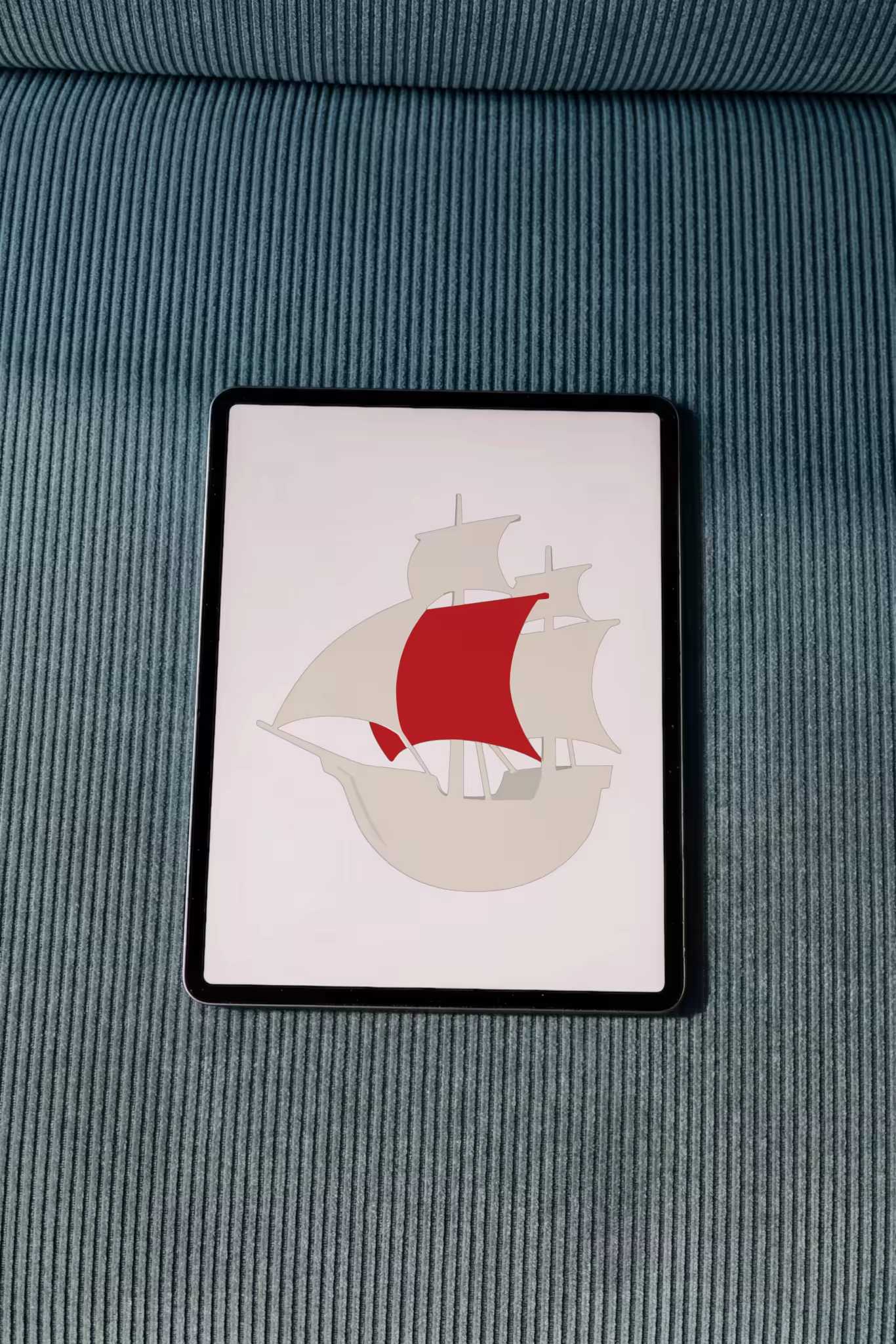 Tablet Mockup on Blue Gray Corduroy Cushions