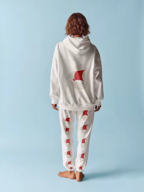 Hoodie and Sweatpants Mockup on a Sky Blue Backdrop