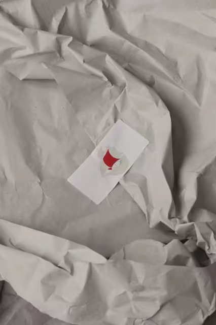 Label Sticker Mockup on Crumpled Tissue Paper