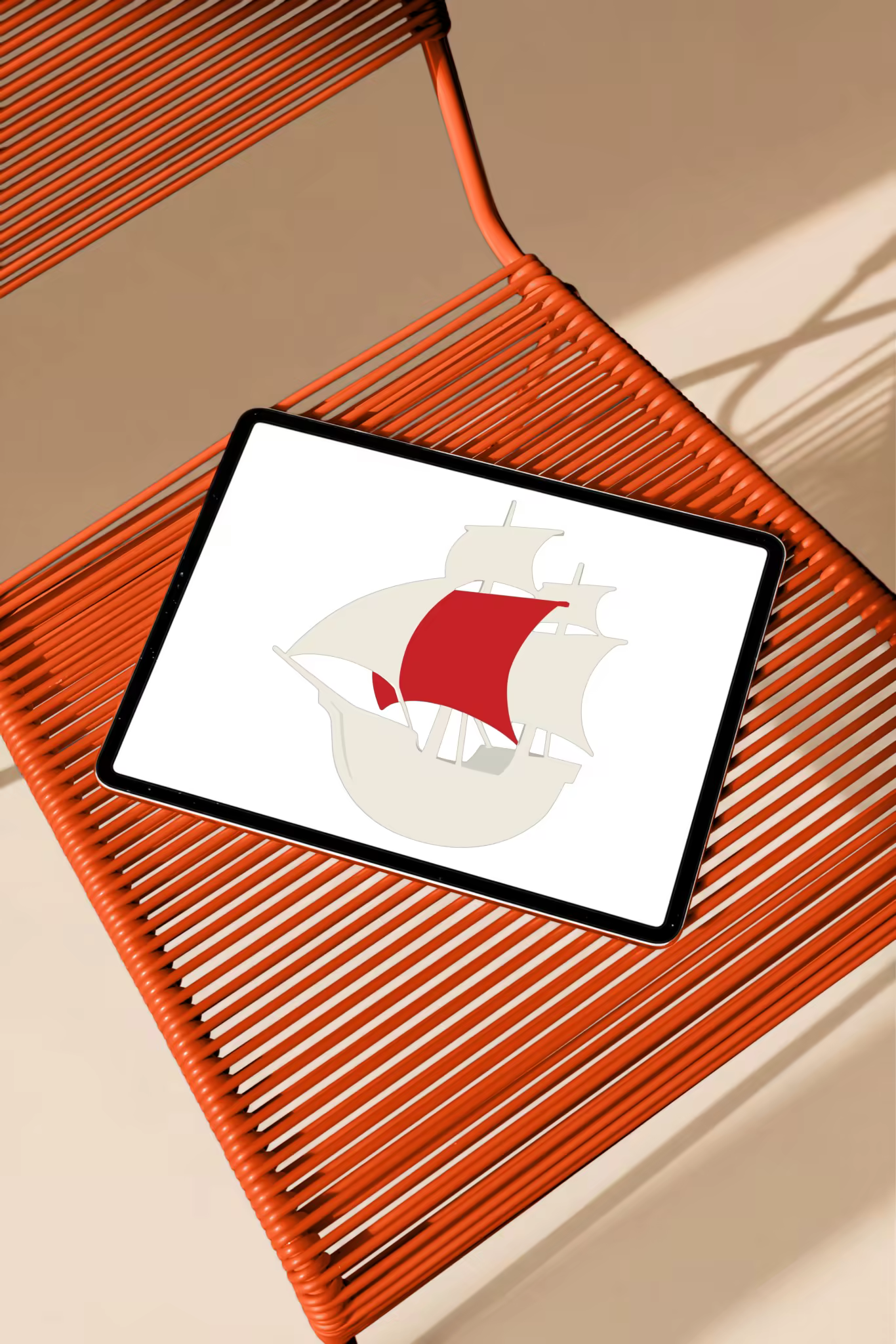 Tablet Mockup on an Orange Cord Chair