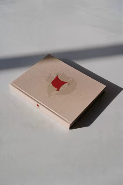 Kraft Hardcover Book Mockup on a White Table