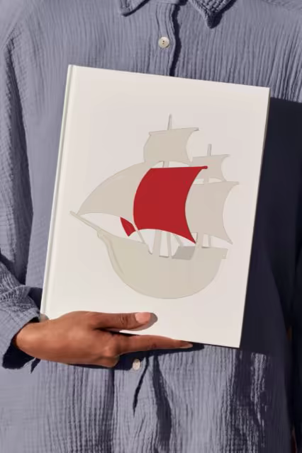 Hardcover Book Mockup Held in Direct Sunlight