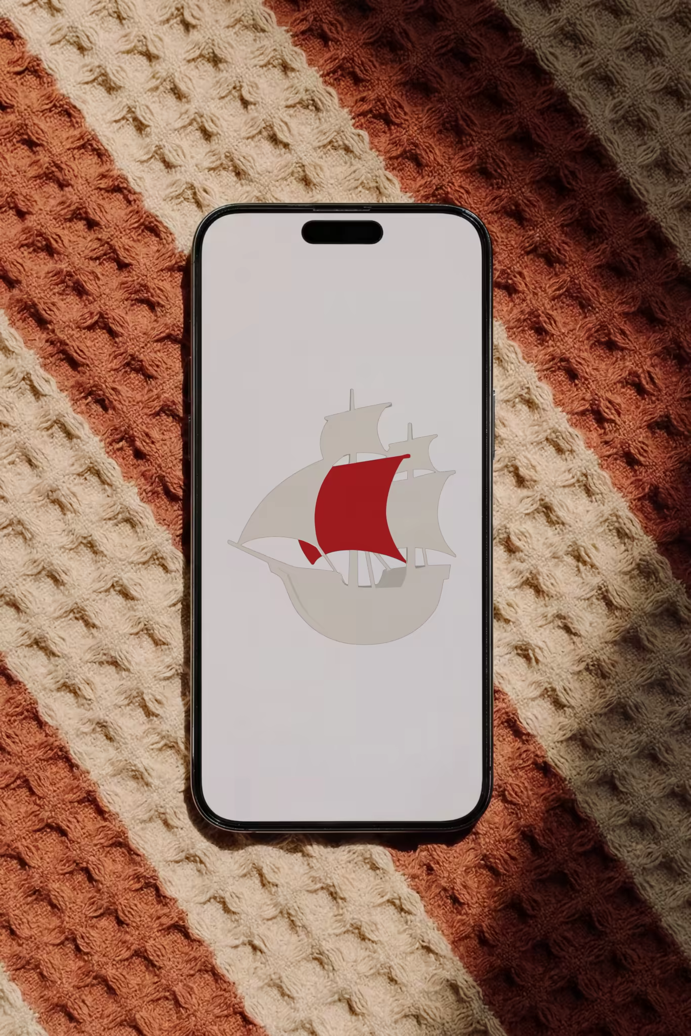 Phone Mockup on a Striped Waffle Knit Blanket