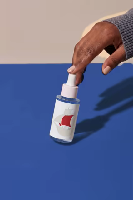 Dropper Bottle Mockup on a Royal Blue Table