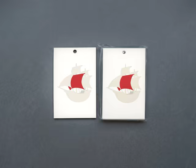 Hang Tag Mockup With Clear Sleeve on Slate