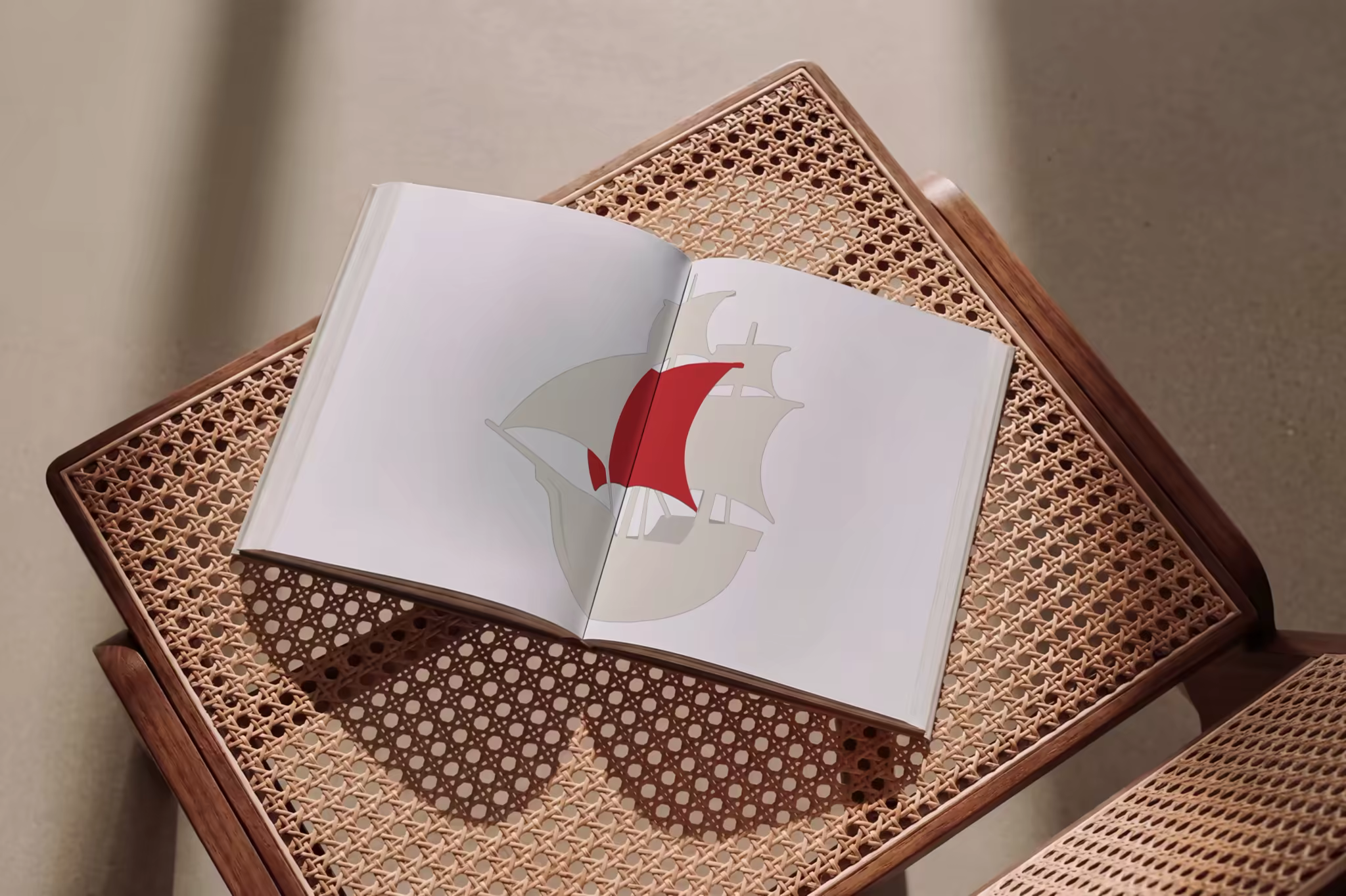 Open Book Mockup on a Woven Cane Table