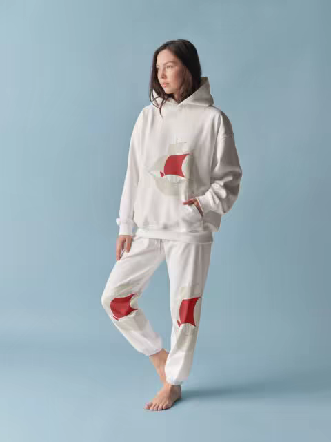 Hoodie and Sweatpants Mockup in a Blue Studio