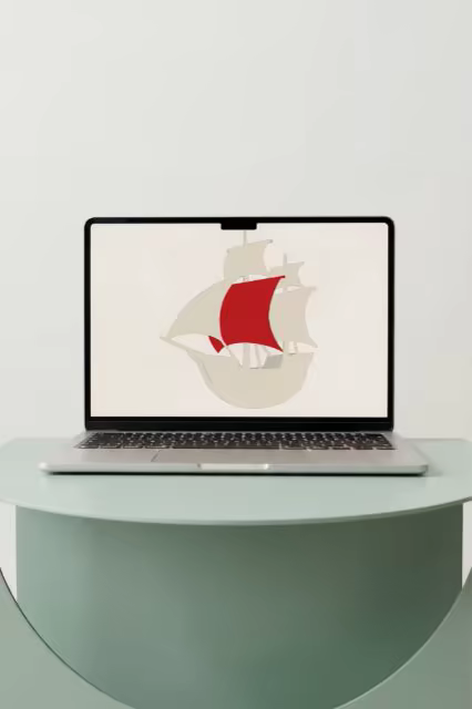 Laptop Mockup on a Curved Sage Green Table