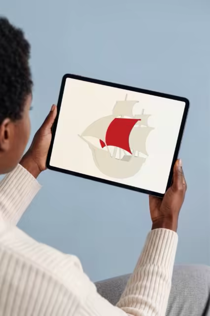 Handheld Tablet Mockup Against a Powder Blue Wall