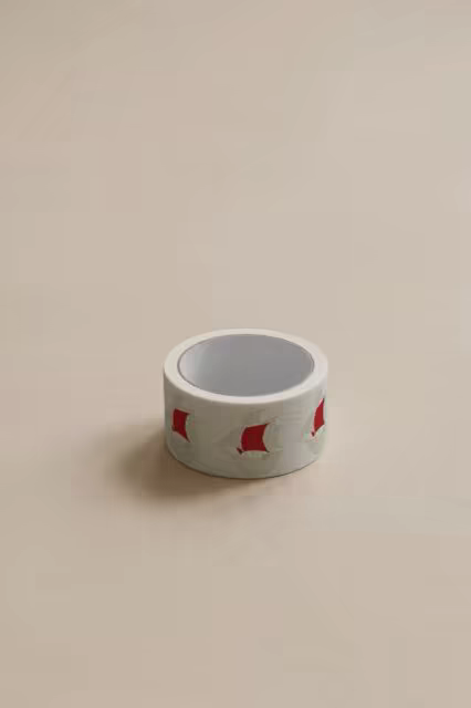 Packing Tape Roll Mockup on a Cream Surface